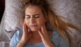 Spiritual Meaning of Grinding Teeth While Sleeping Uncovered